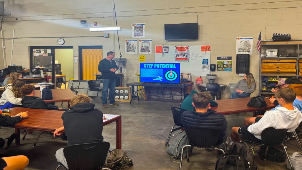 High Voltage lineman trainning in a class